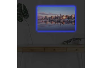 Lerretsbilde med LED-belysning - Bysilhuett ved solnedgang med refleksjoner i vannet - Blå / Oransje / Lilla - Interiør - Maleri & posters - Lerretsbilder