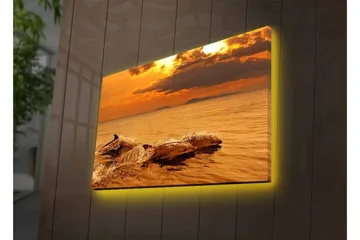 Lerretsbilde med LED-belysning - Delfiner som hopper i solnedgangens glødende lys - Gull / Oransje / Brun - Interiør - Maleri & posters - Lerretsbilder