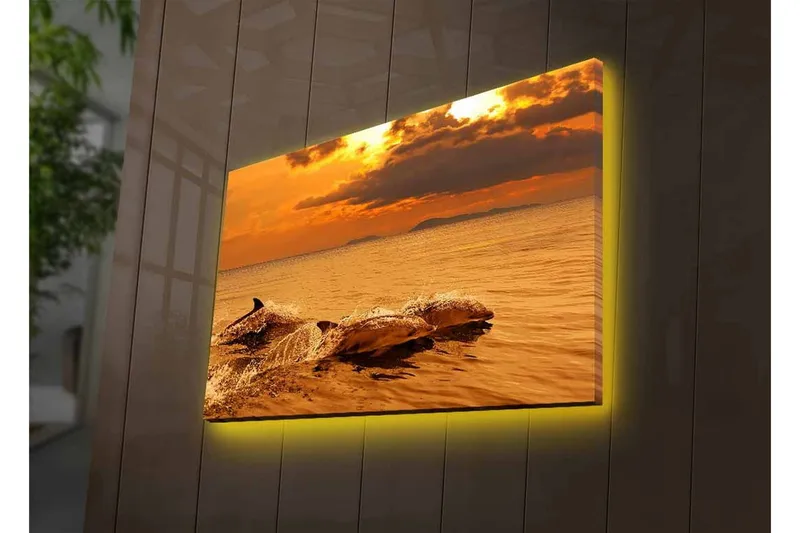 Lerretsbilde med LED-belysning - Delfiner som hopper i solnedgangens glødende lys - Gull / Oransje / Brun - Interiør - Maleri & posters - Lerretsbilder
