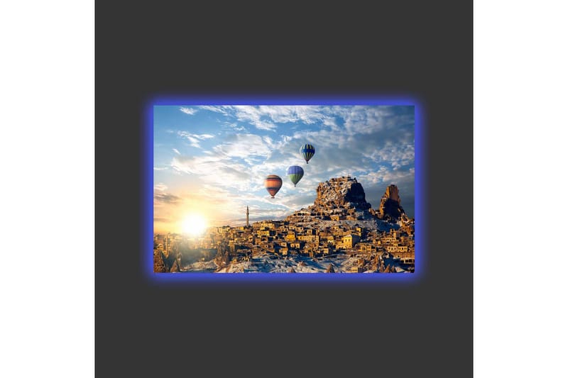 Lerretsbilde med LED-belysning - Fargerike varmluftsballonger som svever over et fjelllandskap med solnedgang - Gull / Blå / Oransje - Interiør - Maleri & posters - Lerretsbilder