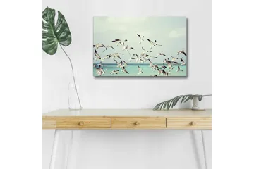 Lerretsbilde med LED-belysning - Flok med fugler som flyr over en blå havoverflate - Lyseblå / Hvit / Svart - Interiør - Maleri & posters - Lerretsbilder