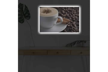 Lerretsbilde med LED-belysning - Kopp kaffe og kanelstenger på en bakgrunn av kaffebønner - Brun / Hvit / Beige - Interiør - Maleri & posters - Lerretsbilder