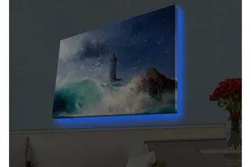Lerretsbilde med LED-belysning - Kystlandskap med et fyrtårn omgitt av sterke bølger - Mørk blå / Turkis / Hvit - Interiør - Maleri & posters - Lerretsbilder