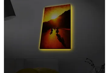 Lerretsbilde med LED-belysning - Motorsykler som kjører langs en vei i solnedgangens gylne lys - Gull / Oransje / Svart - Interiør - Maleri & posters - Lerretsbilder