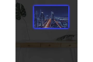 Lerretsbilde med LED-belysning - Nattlig bysilhuett med opplyste skyskrapere - Mørk blå / Lys oransje / Hvit - Interiør - Maleri & posters - Lerretsbilder
