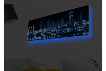 Lerretsbilde med LED-belysning - Nattlig bysilhuett med opplyste skyskrapere - Mørk blå / Svart / Hvit - Interiør - Maleri & posters - Lerretsbilder