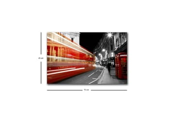 Lerretsbilde med LED-belysning - Rød buss i bevegelse på en svart-hvit bygate - Rød / Svart / Grå - Interiør - Maleri & posters - Lerretsbilder