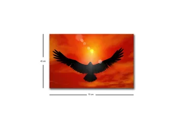 Lerretsbilde med LED-belysning - Silhuett av en ørn som flyr mot en solnedgang i sterke farger - Rød / Svart / Oransje - Interiør - Maleri & posters - Lerretsbilder