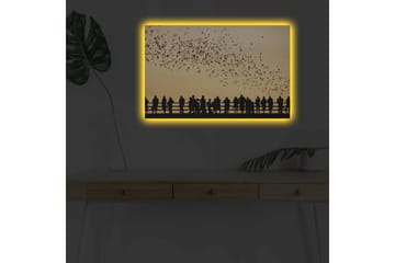 Lerretsbilde med LED-belysning - Silhuetter av mennesker mot en gyllen himmel med svevende fugler - Gull / Svart - Interiør - Maleri & posters - Lerretsbilder