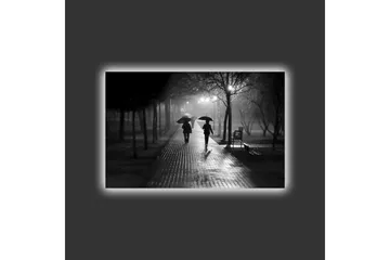 Lerretsbilde med LED-belysning - Silhuetter av to personer med paraplyer på en regnfull gate - Svart / Grå - Interiør - Maleri & posters - Lerretsbilder