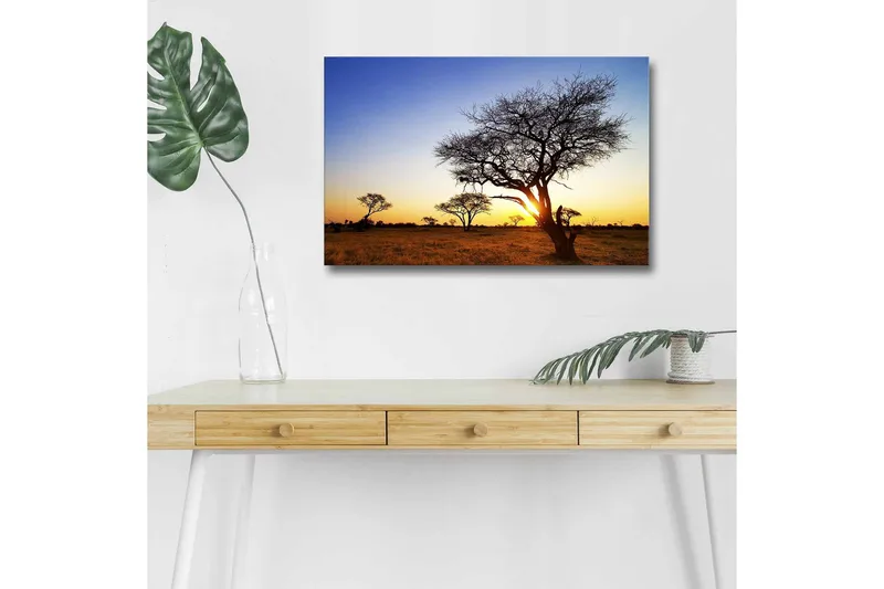 Lerretsbilde med LED-belysning - Silhuetter av trær mot en solnedgang på savannen, Gull / Blå / Svart