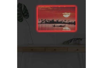Lerretsbilde med LED-belysning - Solnedgang over en rolig innsjø med silhuetter av palmer og en båt - Rød / Svart / Oransje - Interiør - Maleri & posters - Lerretsbilder