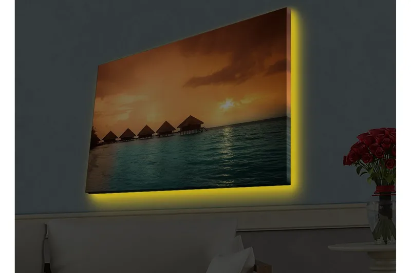 Lerretsbilde med LED-belysning - Solnedgang over en tropisk strand med bungalower over vannet - Oransje / Turkis - Interiør - Maleri & posters - Lerretsbilder