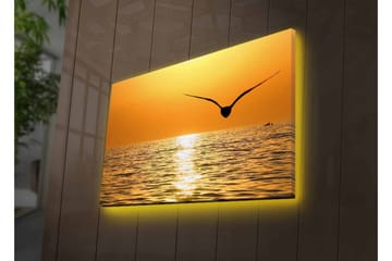 Lerretsbilde med LED-belysning - Solnedgang over havet med en fugl i flukt - Gull / Oransje / Svart - Interiør - Maleri & posters - Lerretsbilder