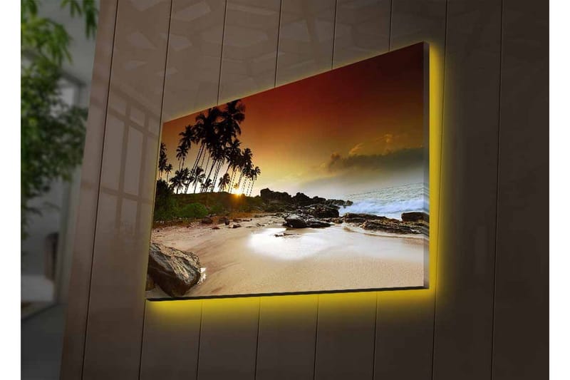 Lerretsbilde med LED-belysning - Solnedgang ved en tropisk strand med palmer og steiner - Mørk brun / Beige / Grønn - Interiør - Maleri & posters - Lerretsbilder
