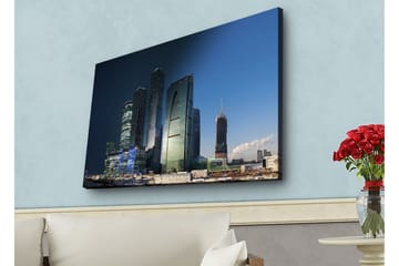 Lerretsbilde med LED-belysning - Storslått bybilde med moderne skyskrapere i kveldslyset - Mørk blå / Grønn / Svart - Interiør - Maleri & posters - Lerretsbilder