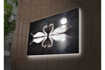 Lerretsbilde med LED-belysning - To svaner som danner et hjerte i en speillignende innsjø under en måne - Hvit / Svart / Grå - Interiør - Maleri & posters - Lerretsbilder