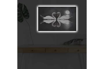 Lerretsbilde med LED-belysning - To svaner som danner et hjerte i en speillignende innsjø under en måne - Hvit / Svart / Grå - Interiør - Maleri & posters - Lerretsbilder