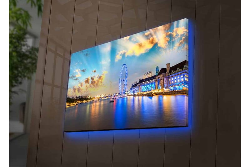 Lerretsbilde med LED-belysning - Vakker utsikt over en by ved vannkanten med et stort pariserhjul og fargerike bygninger - Blå / Gul / Hvit - Interiør - Maleri & posters - Lerretsbilder