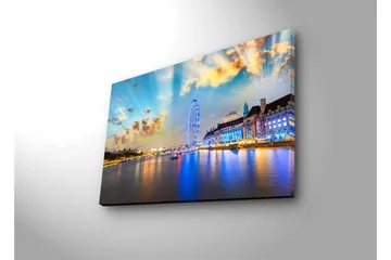 Lerretsbilde med LED-belysning - Vakker utsikt over en by ved vannkanten med et stort pariserhjul og fargerike bygninger - Blå / Gul / Hvit - Interiør - Maleri & posters - Lerretsbilder