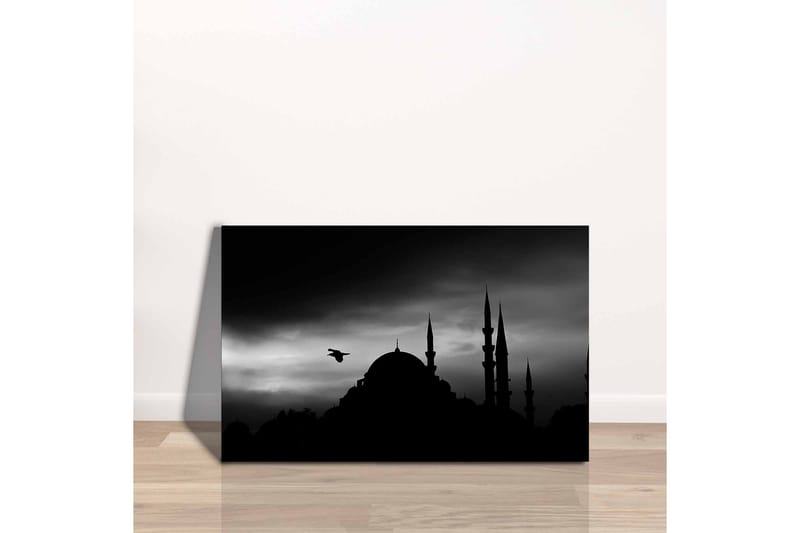 Lerretsbilde - Silhuett av en moské med spir i dramatisk himmel - Svart / Grå - Interiør - Maleri & posters - Lerretsbilder