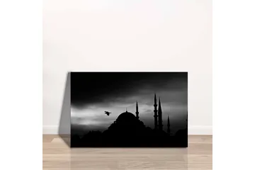 Lerretsbilde - Silhuett av en moské med spir i dramatisk himmel - Svart / Grå - Interiør - Maleri & posters - Lerretsbilder