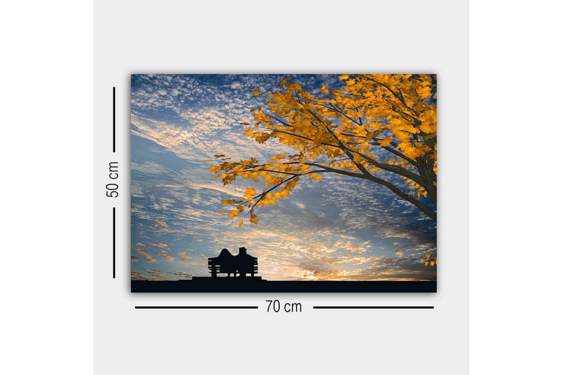 Lerretsbilde - Silhuett av et par som sitter på en benk under et tre med gyldne høstblader - Gull / Blå / Svart - Interiør - Maleri & posters - Lerretsbilder