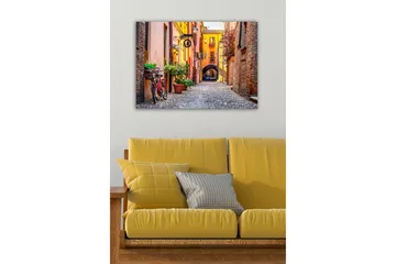 Lerretsbilde - Sjarmerende gate med sykkel og fargerike bygninger - Oransje / Grønn / Rød - Interiør - Maleri & posters - Lerretsbilder