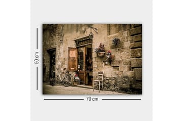Lerretsbilde - Sjarmerende gatebilde med sykkel og åpen dør til butikk - Beige / Brun / Grønn - Interiør - Maleri & posters - Lerretsbilder