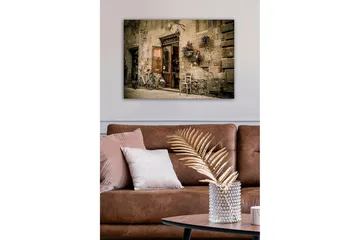 Lerretsbilde - Sjarmerende gatebilde med sykkel og åpen dør til butikk - Beige / Brun / Grønn - Interiør - Maleri & posters - Lerretsbilder