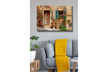 Lerretsbilde - Sjarmerende husfasade med blomster og grønne skodder - Terrakotta / Grønn / Beige - Interiør - Maleri & posters - Lerretsbilder