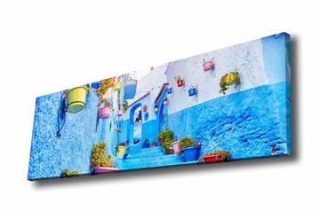 Lerretsbilde - Vakker smug med blå vegger og fargerike blomsterpotter - Blå / Hvit / Gul - Interiør - Maleri & posters - Lerretsbilder