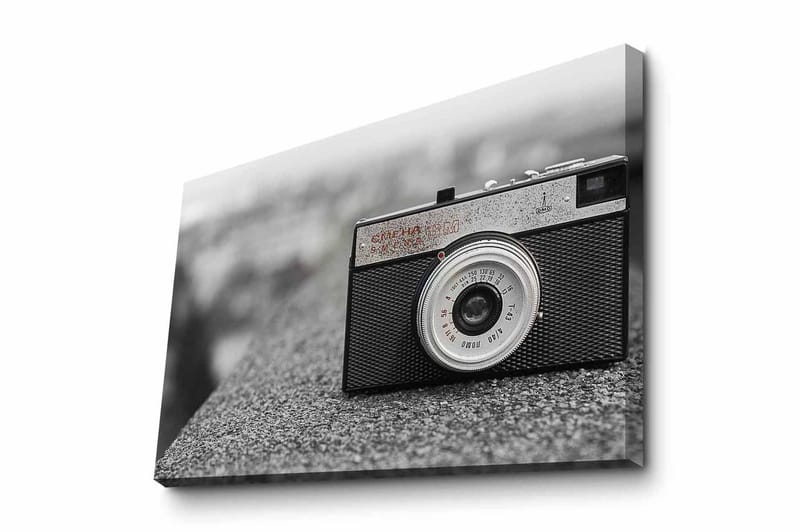 Lerretsbilde - Vintage kamera på en grå overflate, Svart / Grå / Sølv