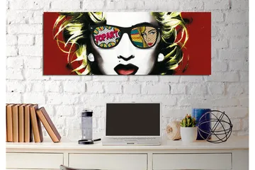 Lerretsbilde - Portrett av en kvinne med solbriller og popkunstmotiver i refleksjonene - Rød / Svart / Gul - Interiør - Maleri & posters - Lerretsbilder