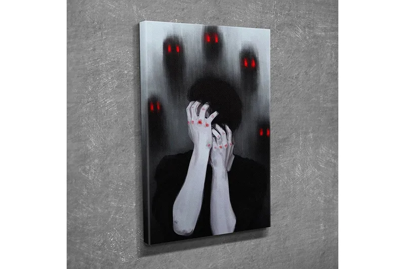 Lite lerretsbilde 30x40 cm - Mørk og følelsesladet skildring av en person som holder hodet i hendene, omgitt av skyggefulle figurer med røde øyne - Svart / Grå / Rød - Interiør - Maleri & posters - Lerretsbilder
