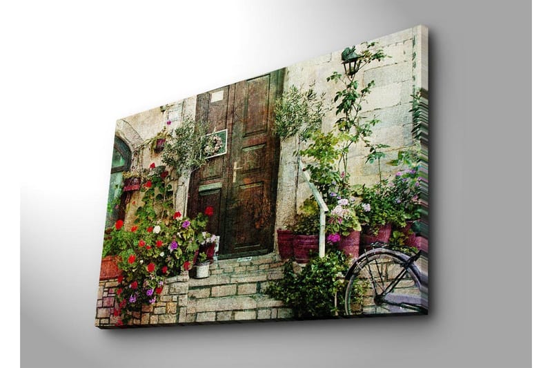 Stort lerretsbilde 100x70 cm - Vakker dør omgitt av fargerike blomster og grøntområder - Rød / Grønn / Lilla - Interiør - Maleri & posters - Lerretsbilder