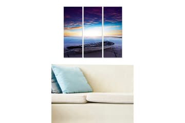 Trelerretsbilde 3-delt 50x70 cm - Båt ved kysten under en fargerik solnedgang - Lilla / Blå / Oransje - Interiør - Maleri & posters - Lerretsbilder