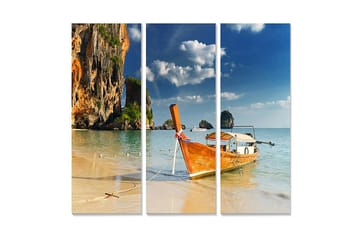 Trelerretsbilde 3-delt 50x70 cm - Båt på en tropisk strand med steiner i bakgrunnen - Oransje / Blå / Grønn - Interiør - Maleri & posters - Lerretsbilder