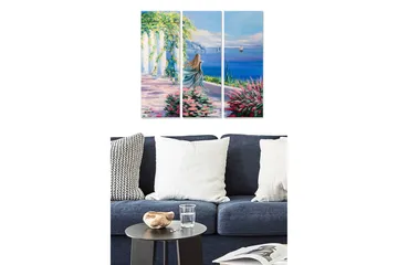 Trelerretsbilde 3-delt 50x70 cm - Vakker kvinne som ser ut over havet med blomster i forgrunnen - Blå / Grønn / Rosa - Interiør - Maleri & posters - Lerretsbilder