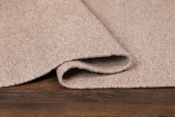 Vaxholm Ullteppe 75x150 cm Oval - Sand - Tekstiler & tepper - Teppe & matte - Moderne matte - Ullteppe